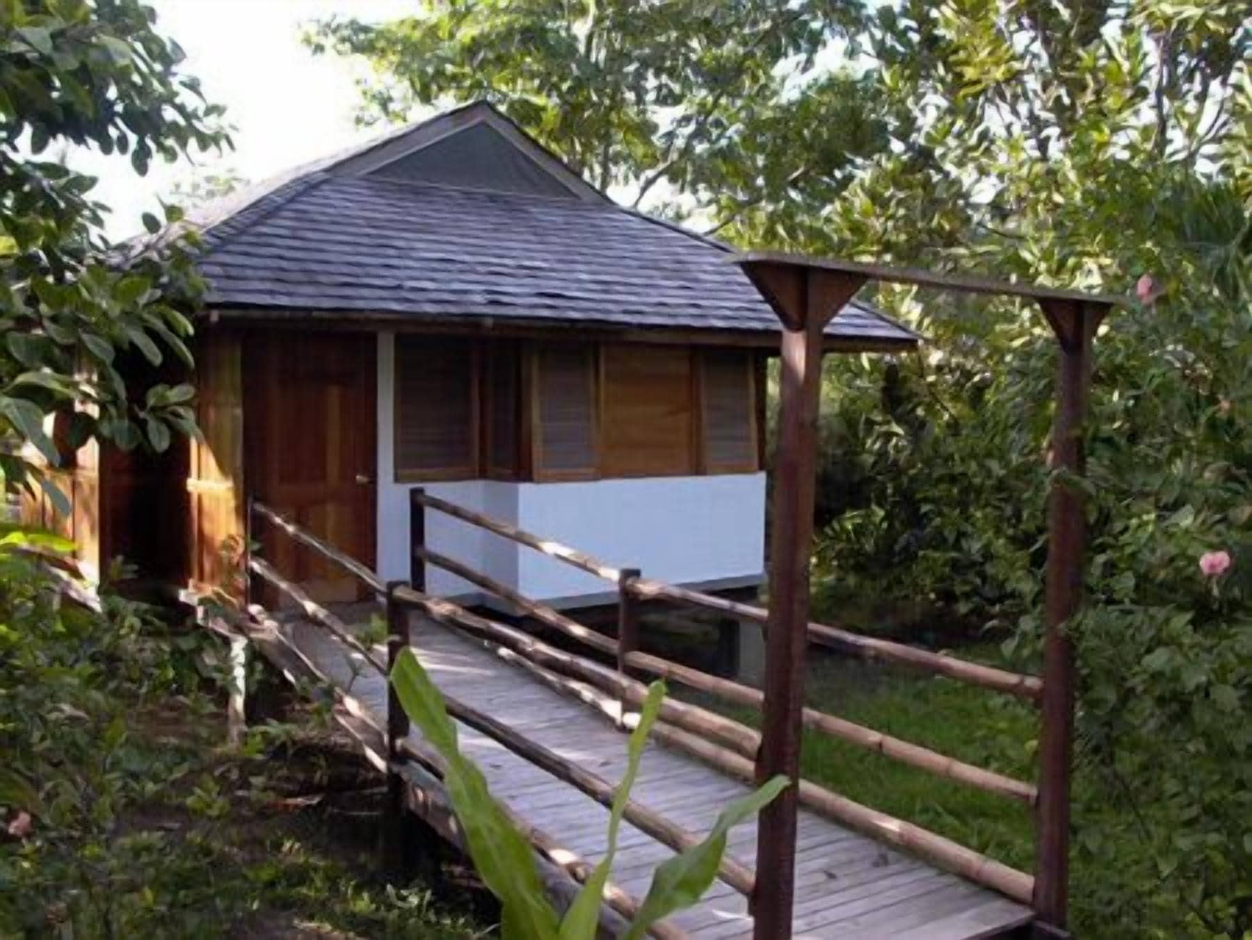 standard cottage, 1 king bed, balcony, ocean view | in-room safe, individually decorated, individually furnished