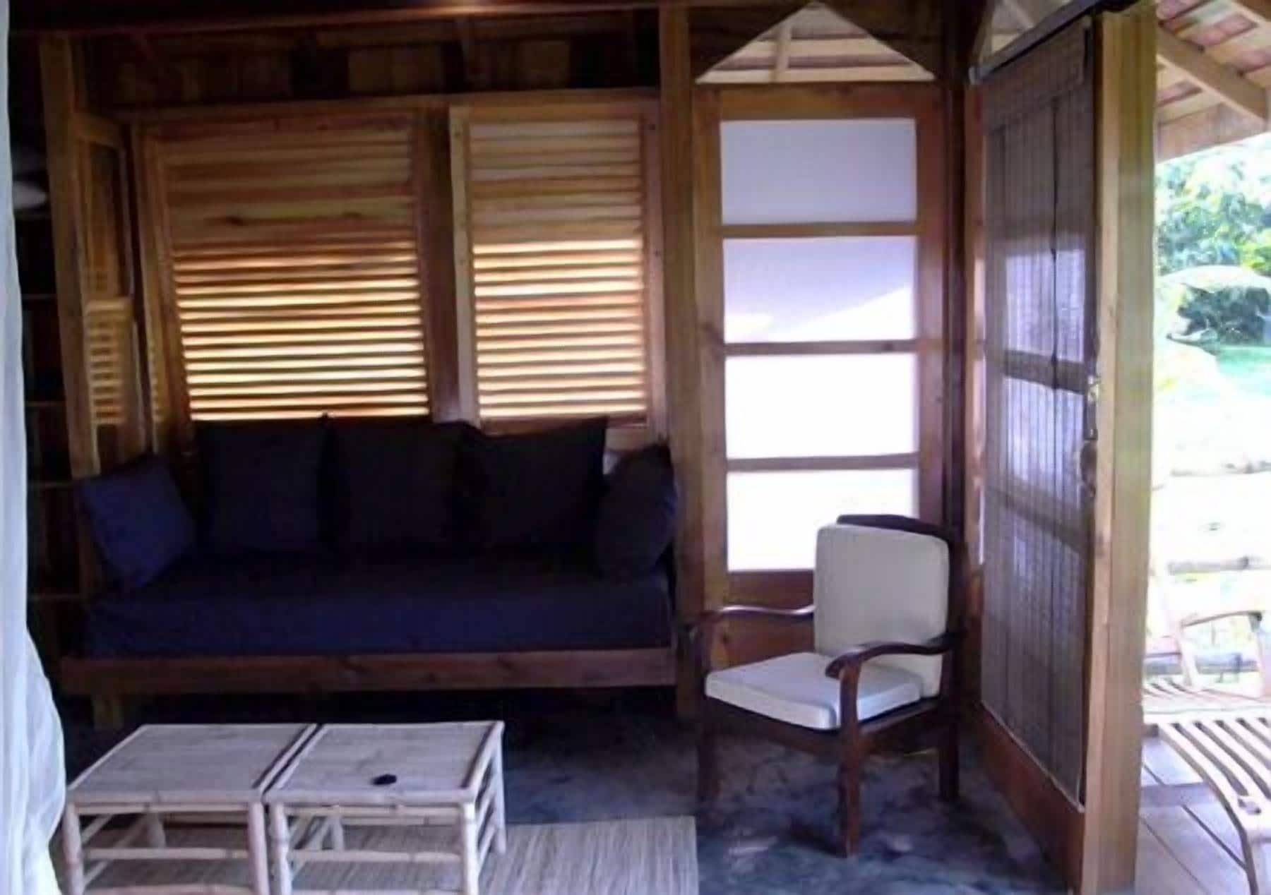 standard cottage, 1 king bed, balcony, ocean view | living area