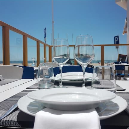 Lunch, dinner served; Portuguese cuisine, beach views