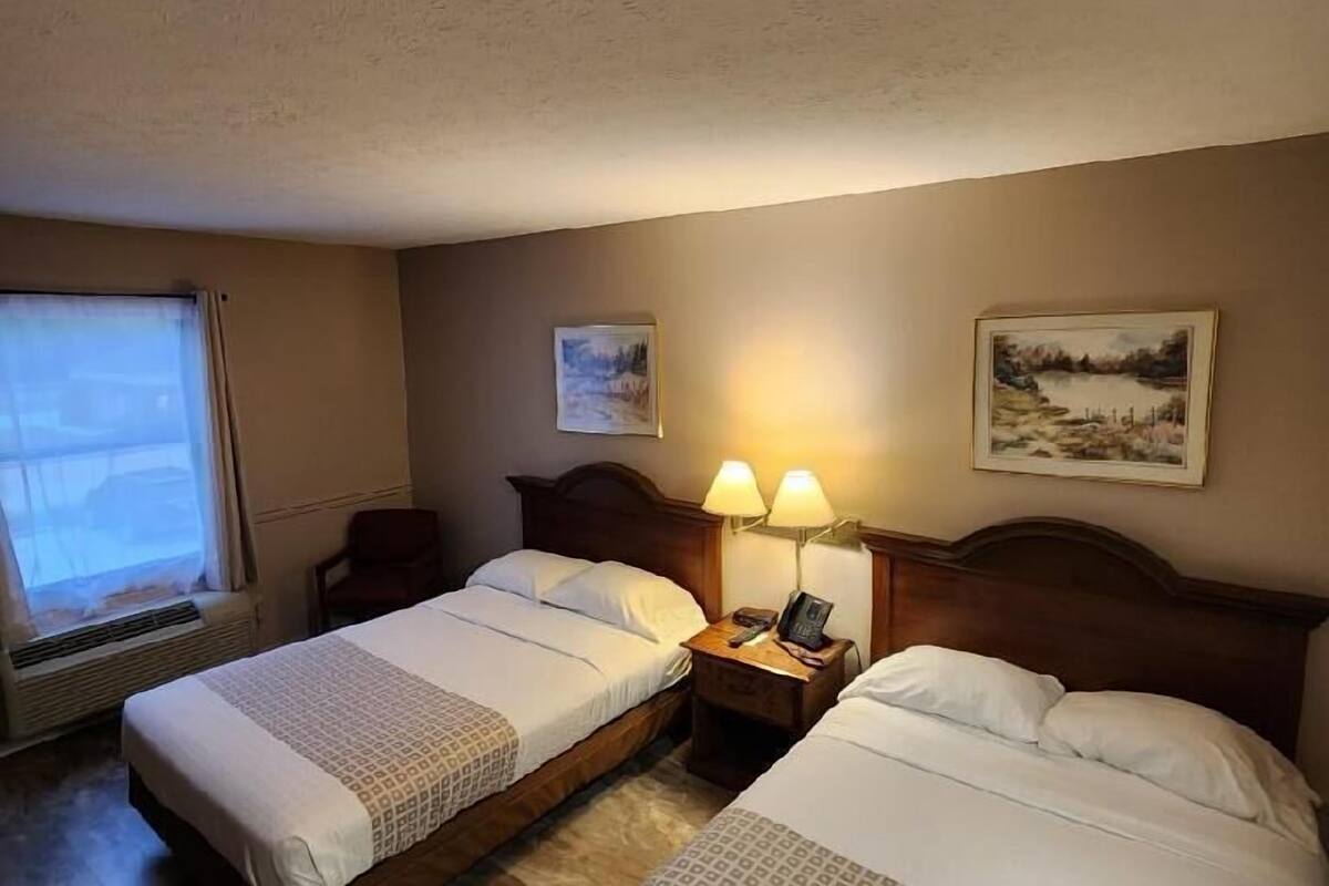 double room, 2 double beds | premium bedding, desk, iron/ironing board, free wifi