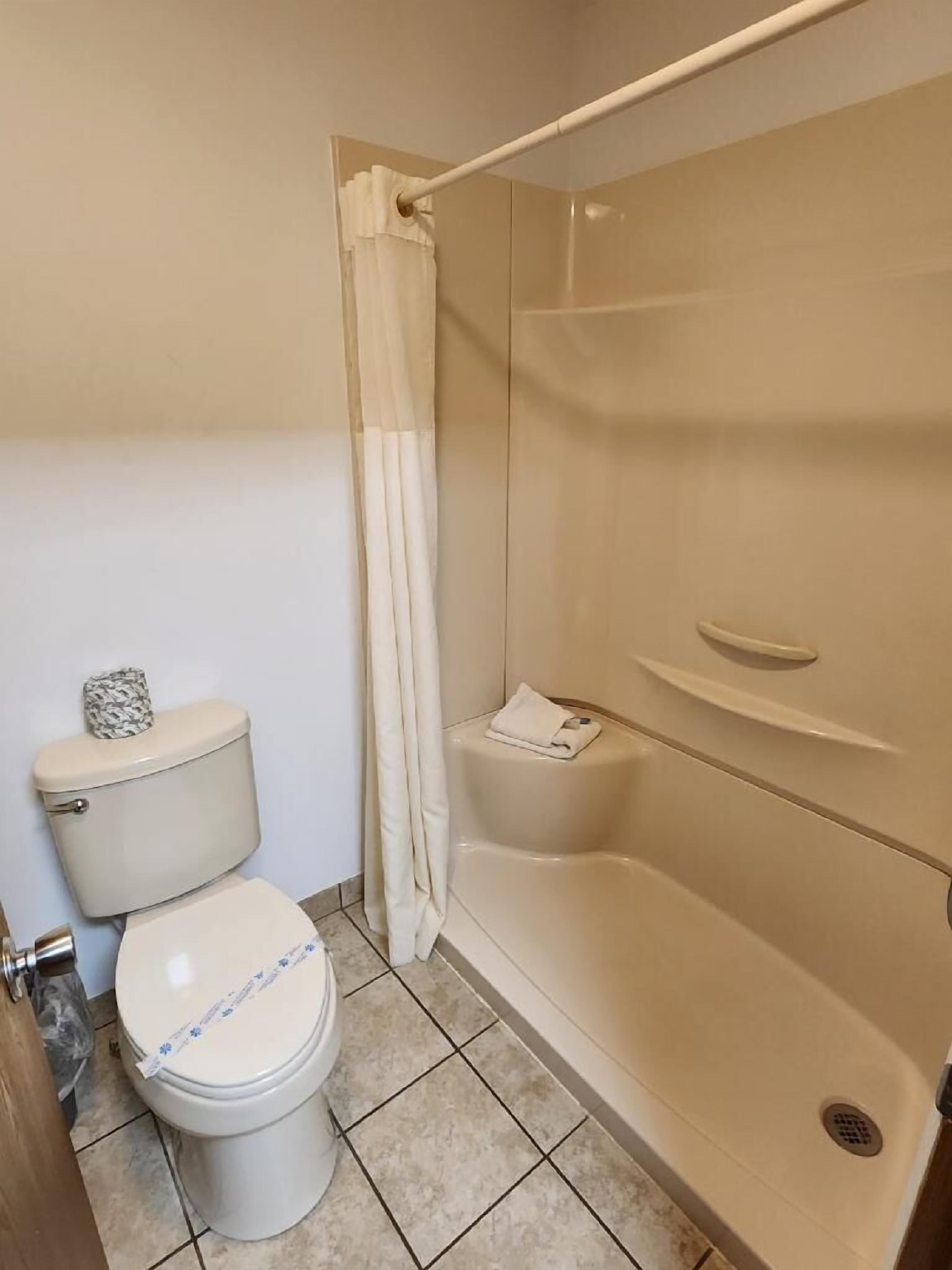 double room, 2 double beds | bathroom | free toiletries, hair dryer, towels