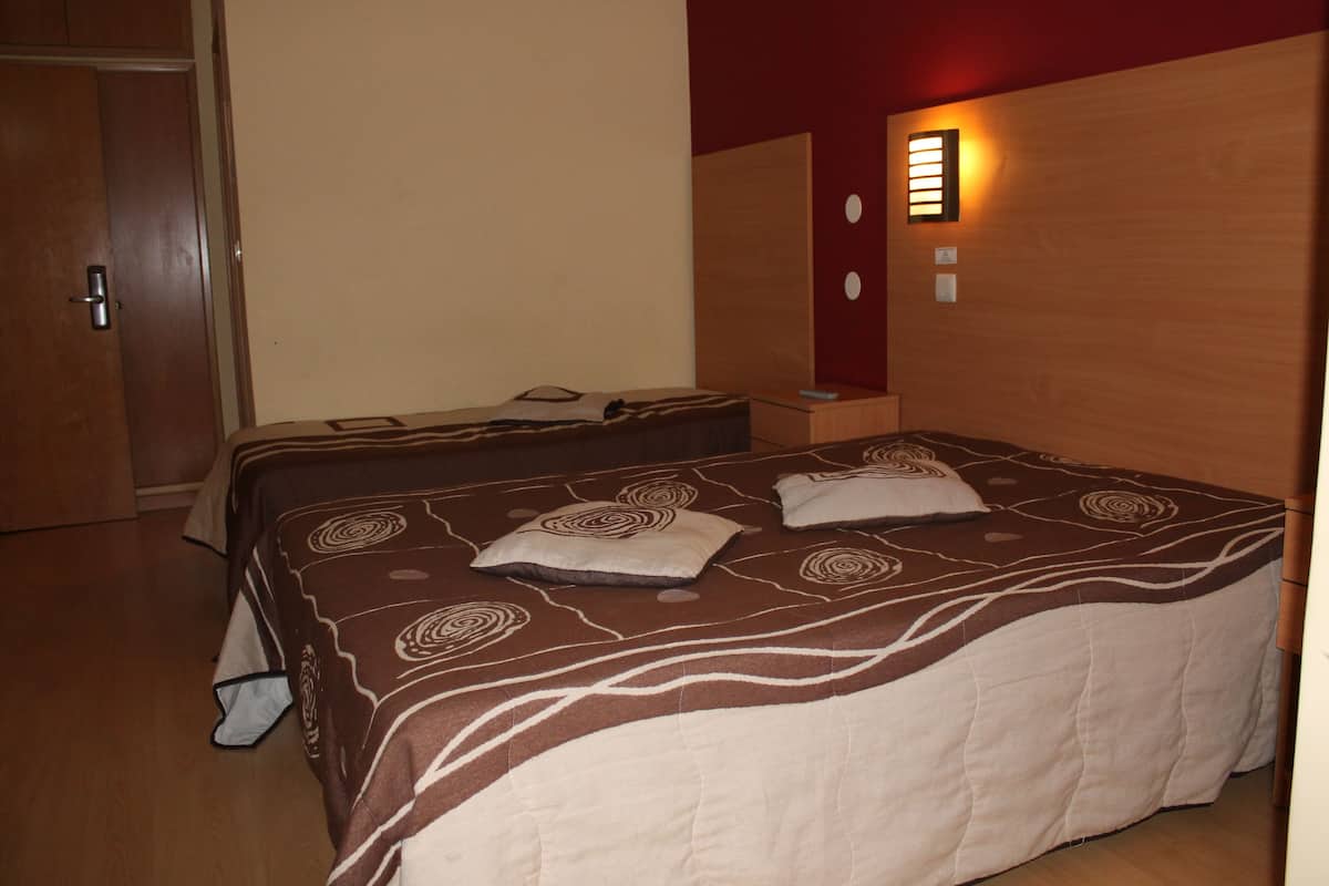 Desk, rollaway beds (surcharge), WiFi (free), bed sheets