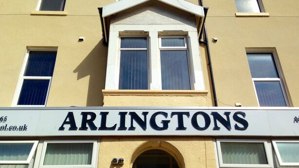 A building with the sign 'ARLINGTONS' above the entrance. - Arlingtons (Blackpool)