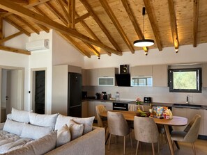 Luxury Villa, 2 Bedrooms, Sea View | Living area | 50-inch flat-screen TV with digital channels, LED TV - Four Seasons Villas (Skiathos)