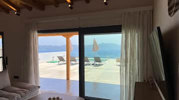 Luxury Villa, 2 Bedrooms, Sea View | Living area | 50-inch flat-screen TV with digital channels, LED TV