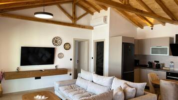 Luxury Villa, 2 Bedrooms, Sea View | Living area | 50-inch flat-screen TV with digital channels, LED TV