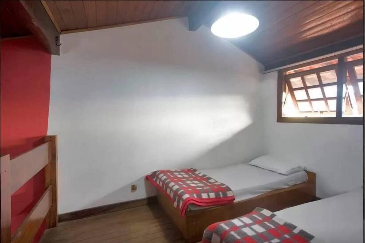 Dúplex familiar, vista parcial al océano | Sábanas de algodón egipcio, minibar y decoración personalizada