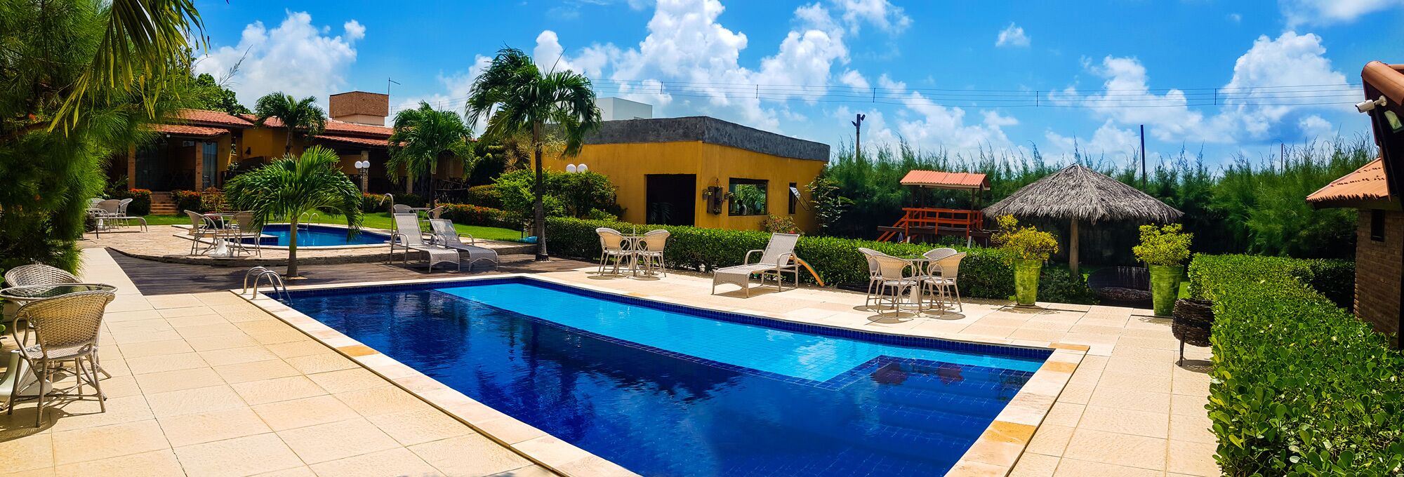 2 outdoor pools, open 8 AM to 8 PM, pool umbrellas, pool loungers