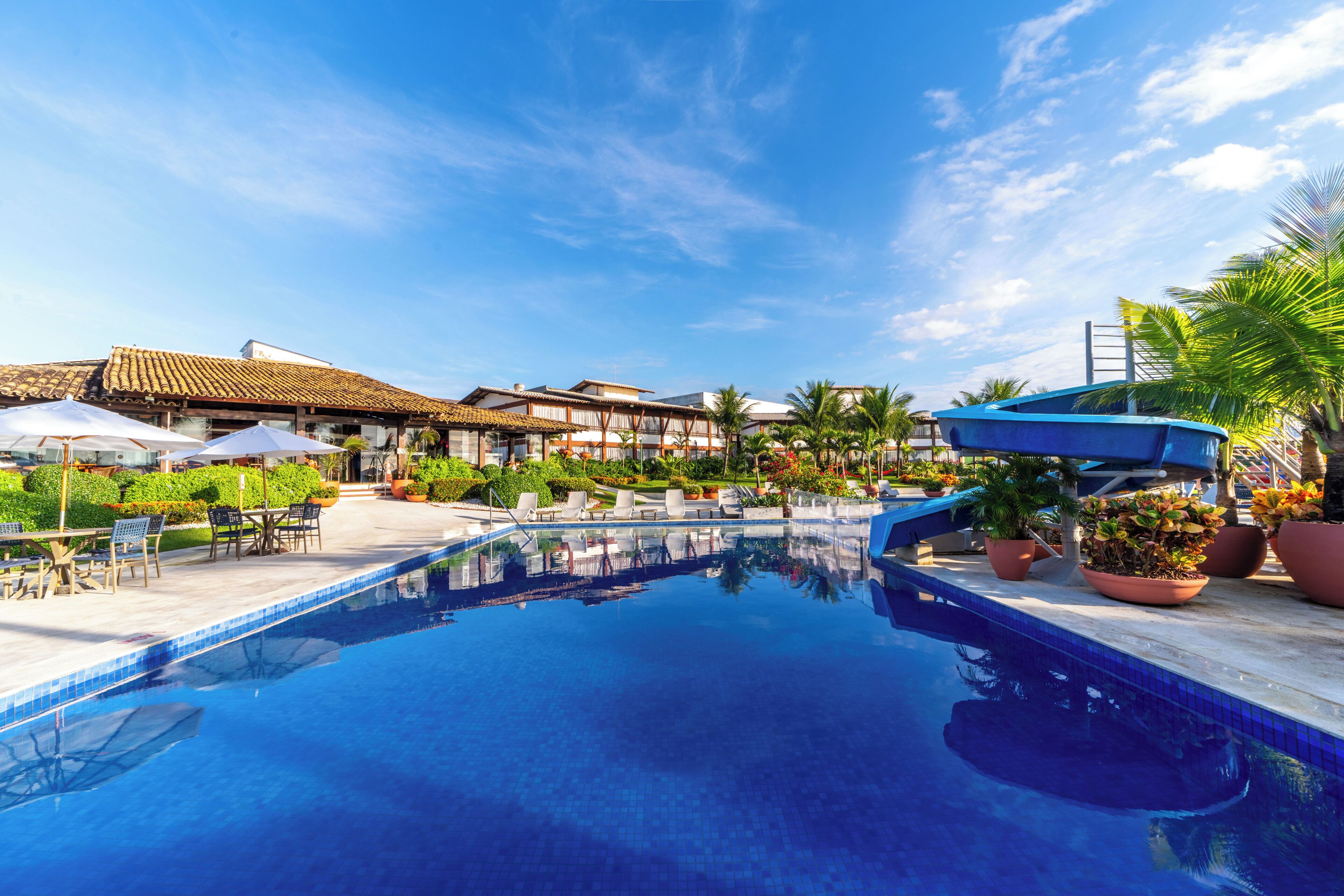 Outdoor pool, open 7:00 AM to 10:00 PM, pool umbrellas, pool loungers