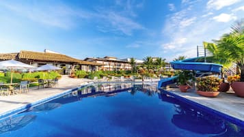 Outdoor pool, open 7:00 AM to 10:00 PM, pool umbrellas, pool loungers