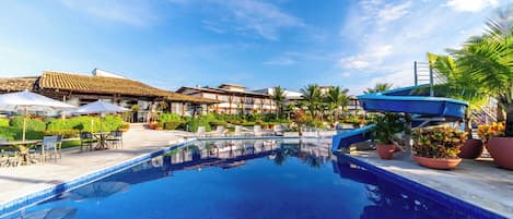 Outdoor pool, open 7:00 AM to 10:00 PM, pool umbrellas, sun loungers
