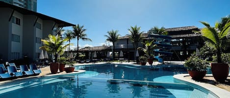 Outdoor pool, pool umbrellas, sun loungers