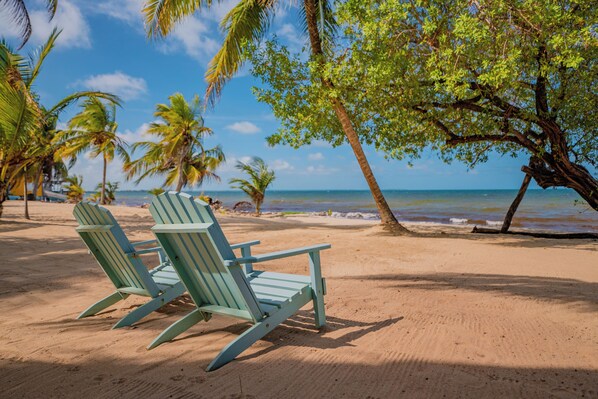 On the beach, sun loungers, beach towels, beach massages - Buttonwood Belize (Hopkins)