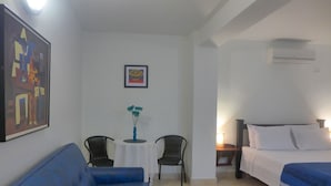Standard Suite | Minibar, in-room safe, desk, iron/ironing board