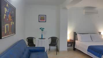 Standard Suite | Minibar, in-room safe, desk, iron/ironing board