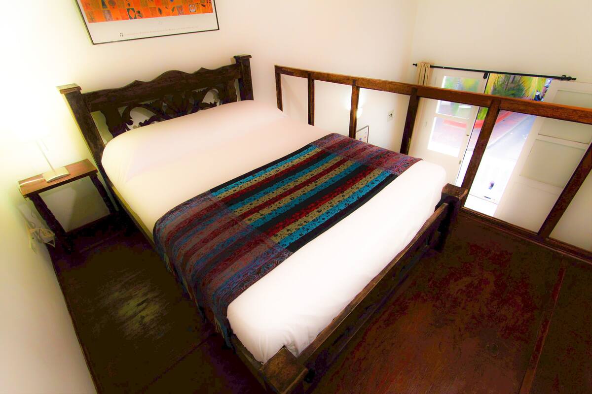 Deluxe Suite, Balcony | Minibar, in-room safe, desk, iron/ironing board