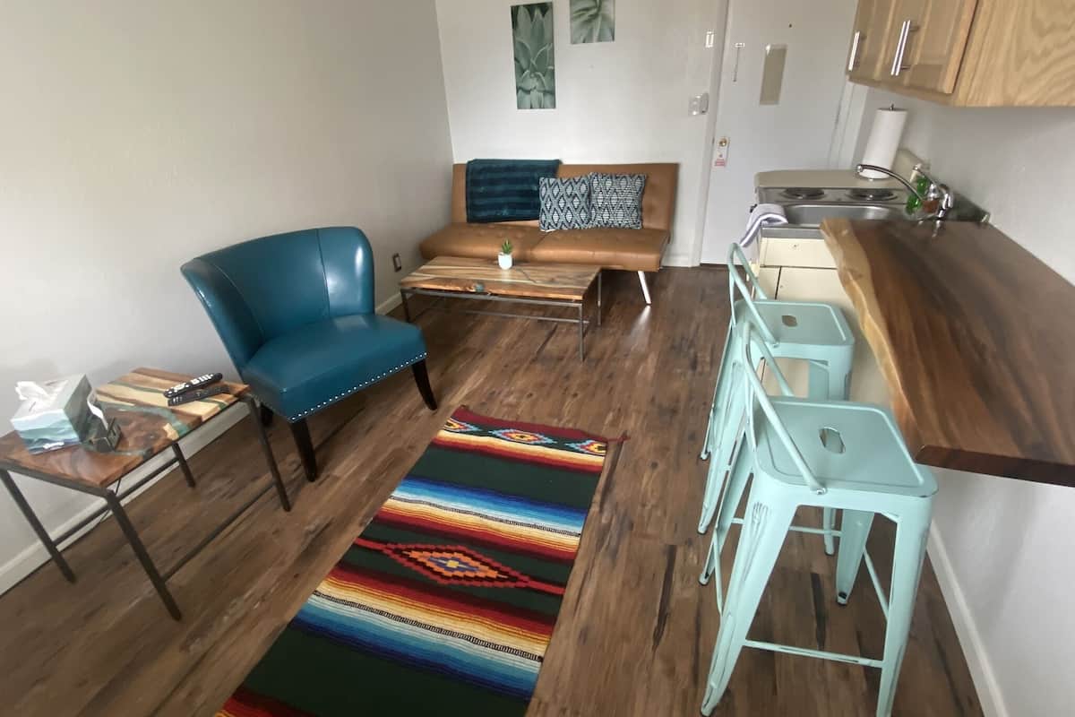 family suite | living area | 32-inch lcd tv with cable channels, tv, streaming services