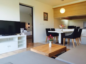 42-inch LED TV with cable channels, TV - Imperial Ocean Palms Service Apartment (Choeng Thale)