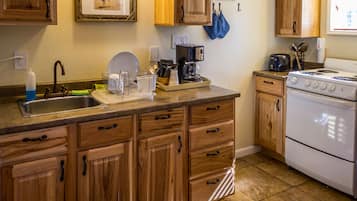 2 Bedroom Suite with Jetted Tub | Private kitchen | Microwave, coffee/tea maker, freezer