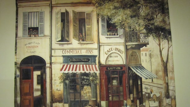 A street view with a building labeled 'COMMERCE de VINS' and 'Café de Paris'. - Aitabi Hostel (Tainan)