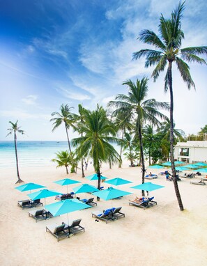 On the beach, white sand, beach towels - The Lind Boracay (Boracay Island)