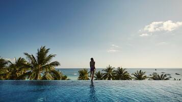 3 outdoor pools, open 7:00 AM to 10:00 PM, pool umbrellas, sun loungers