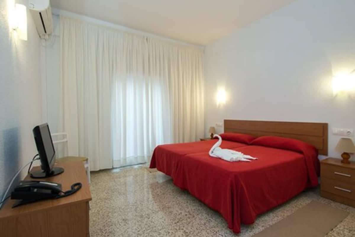 Desk, rollaway beds (surcharge), WiFi (free), bed sheets
