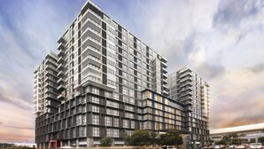A multi-story residential building with a modern architectural design, featuring a grid of balconies and large windows. - Golden Phoenix Hotel Manila (Pasay)