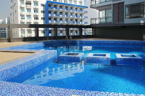 Outdoor pool, open 9:00 AM to 6:00 PM, pool umbrellas, sun loungers