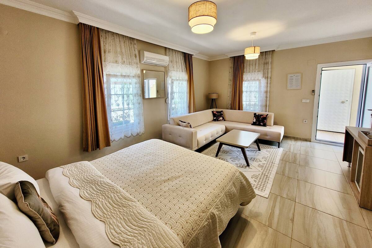 family room | premium bedding, minibar, in-room safe, free wifi