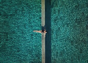 Seasonal outdoor pool, pool umbrellas, pool loungers