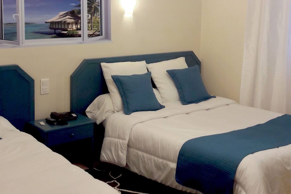 Standard Quadruple Room | In-room safe, desk