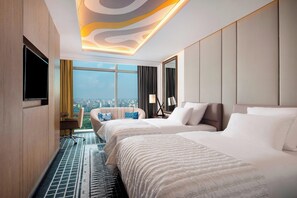 Club-huone, 2 parisänkyä | Ylelliset vuodevaatteet, minibaari, tallelokero huoneessa, työpöytä