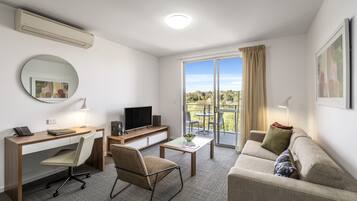 42-inch flat-screen TV with digital channels, TV, DVD player