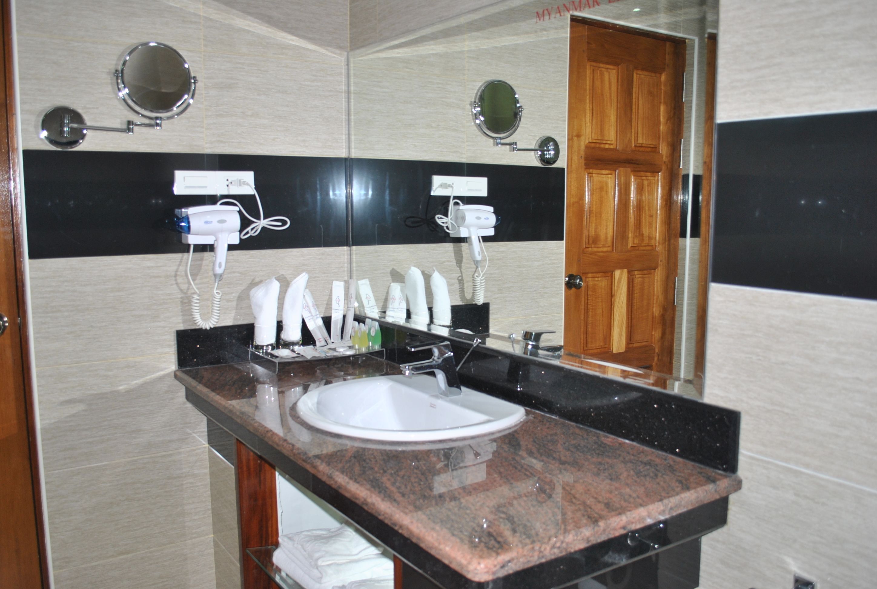 suite (luxury suite lower) | bathroom | free toiletries, hair dryer, slippers, towels