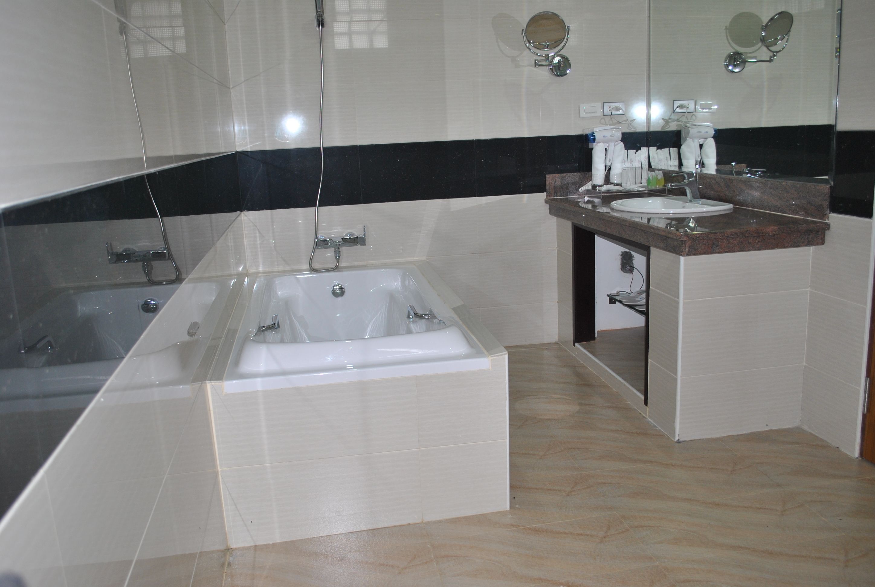 suite (luxury suite upper) | bathroom | free toiletries, hair dryer, slippers, towels