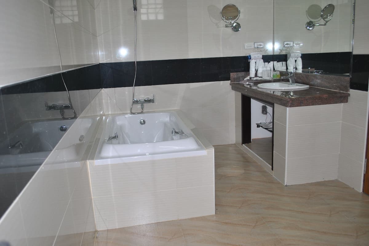 suite (luxury suite upper) | bathroom | free toiletries, hair dryer, slippers, towels