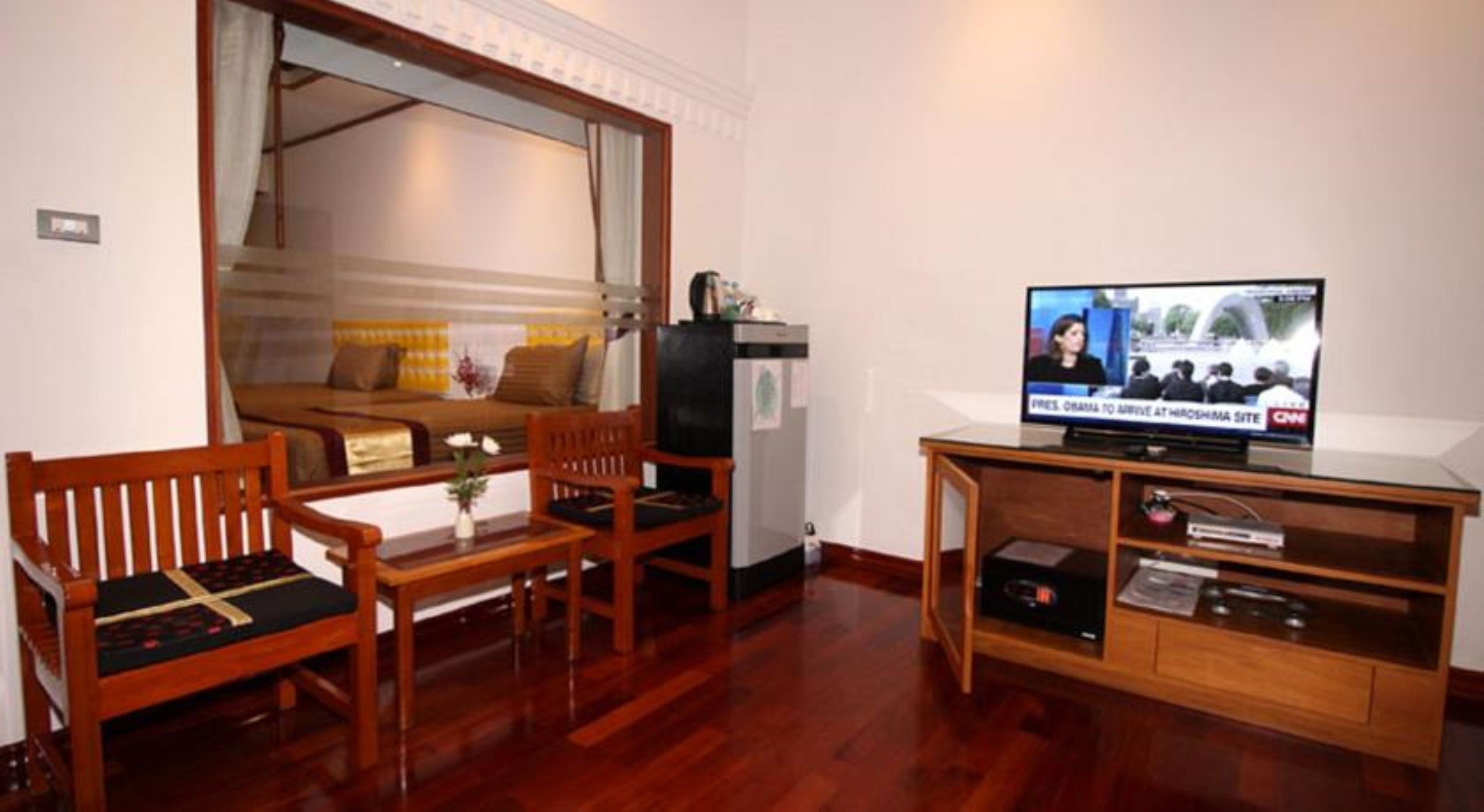 suite (myanmar life suite) | living area | 32-inch flat-screen tv with satellite channels, tv