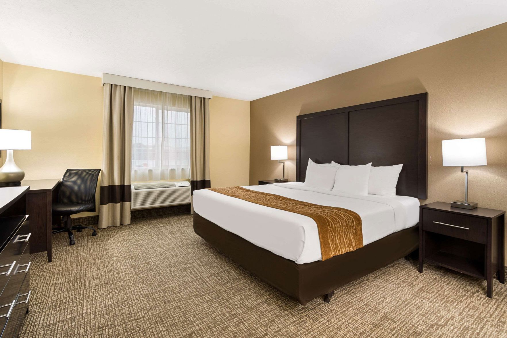 Premium bedding, down comforters, desk, laptop workspace