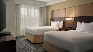 Premium bedding, desk, iron/ironing board, free cribs/infant beds