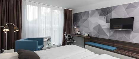 Hypo-allergenic bedding, in-room safe, desk, laptop workspace