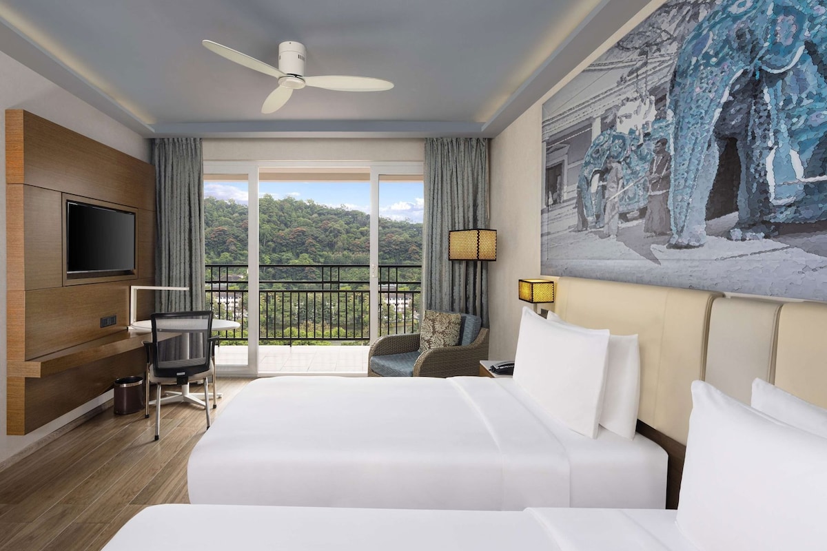 Premium bedding, down comforters, memory foam beds, minibar