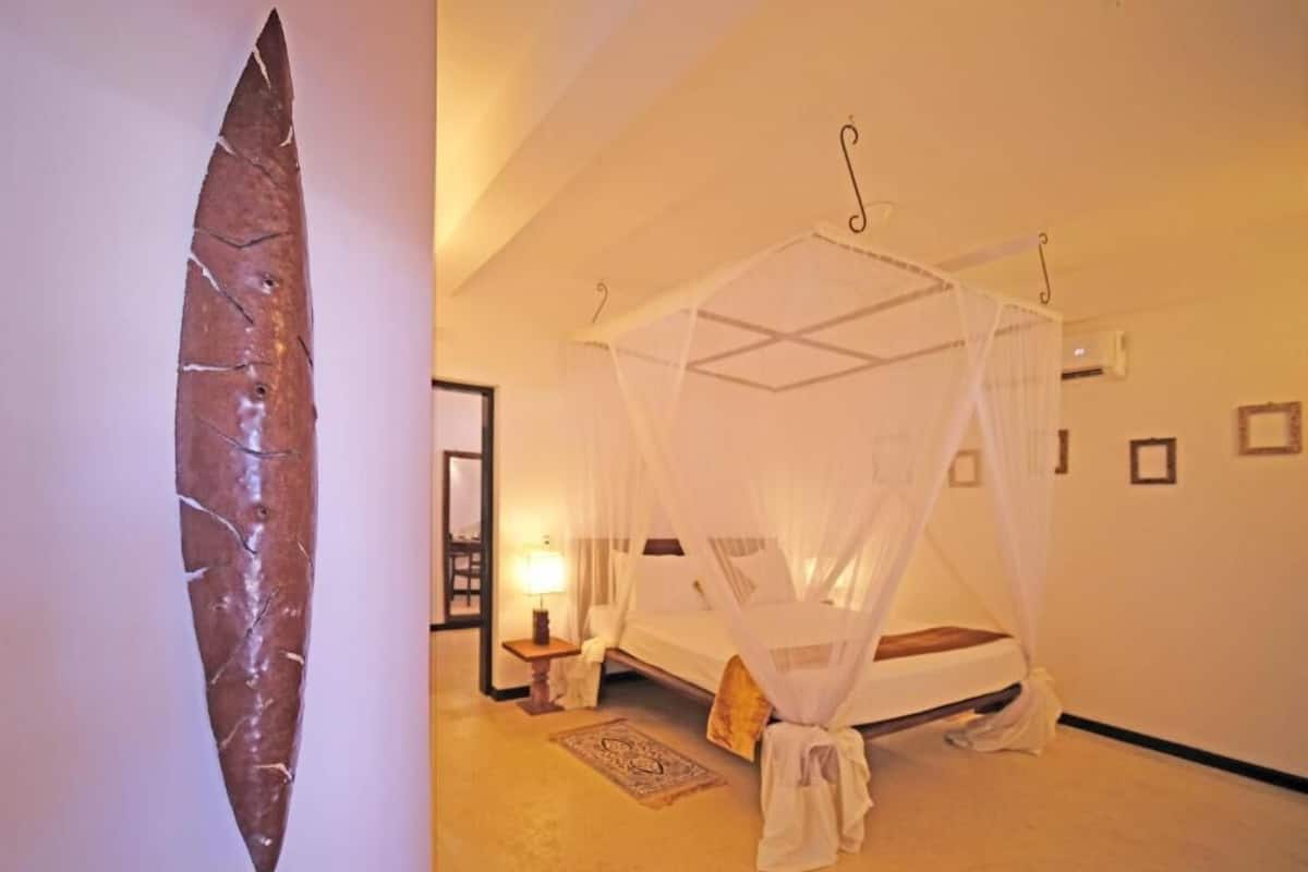 Junior Suite, Beach View | Premium bedding, minibar, in-room safe, desk