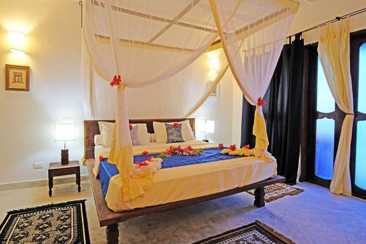 Family Suite, Garden View | Premium bedding, minibar, in-room safe, desk