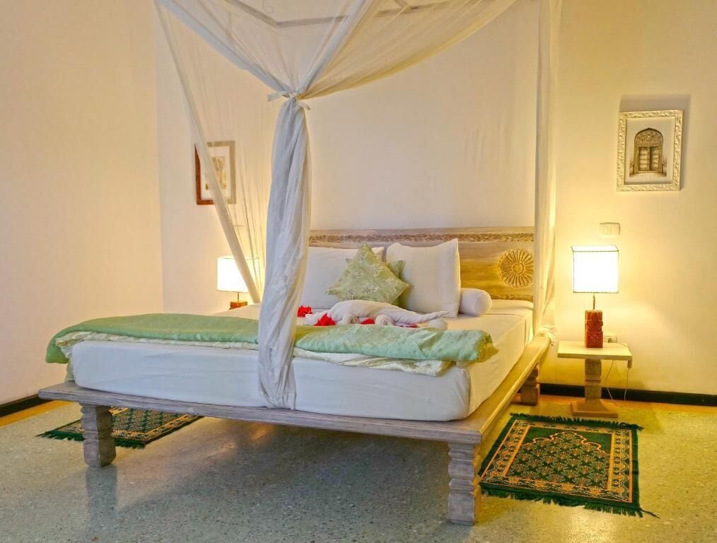 Ropa de cama de alta calidad y minibar 