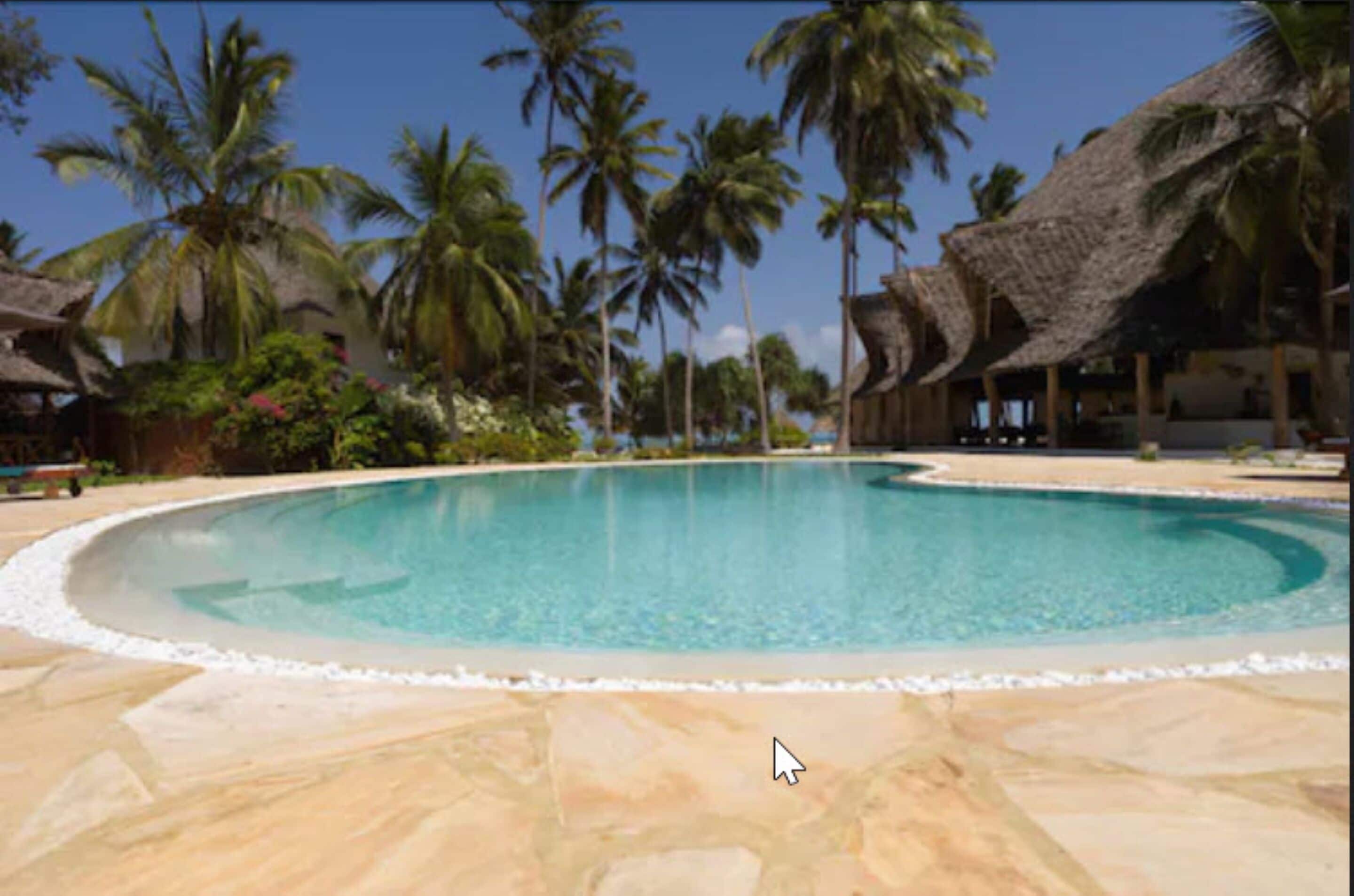 outdoor pool, open 7:00 am to 7:00 pm, pool umbrellas, pool loungers