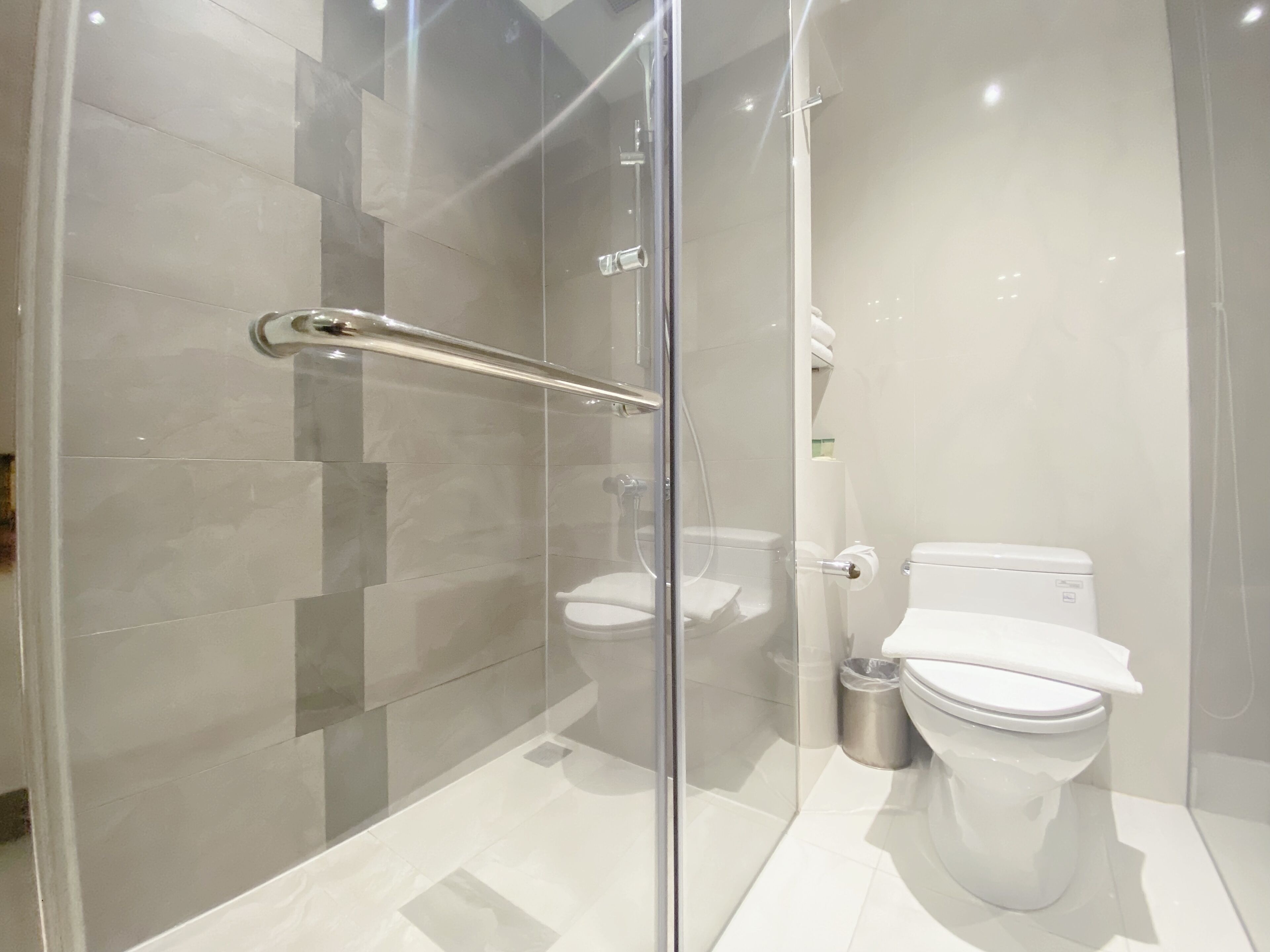 shower, eco-friendly toiletries, hair dryer, slippers