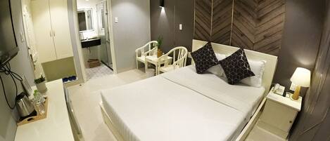 Standard Room, 1 Double Bed | Living area | 32-inch LED TV with satellite channels, TV