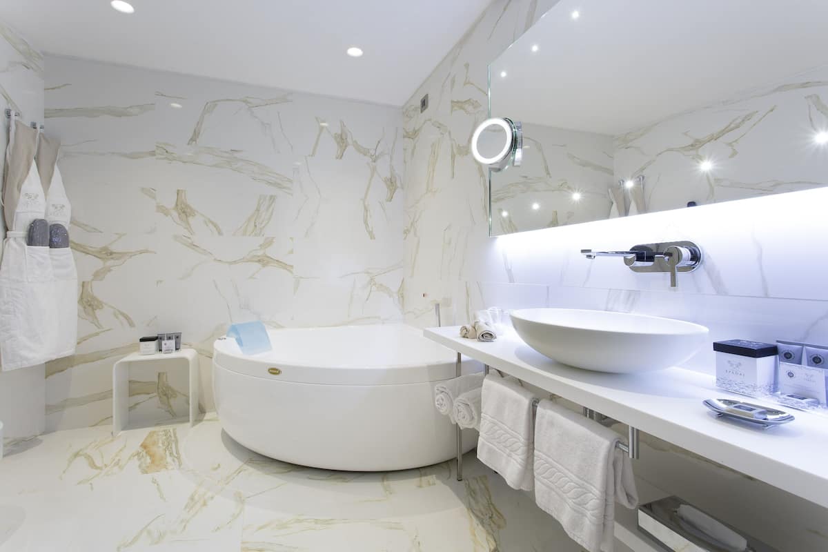 free toiletries, hair dryer, bidet, towels