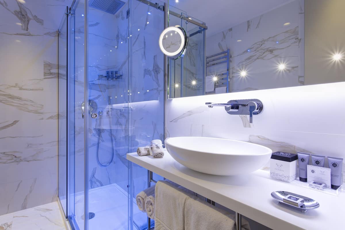 free toiletries, hair dryer, bidet, towels